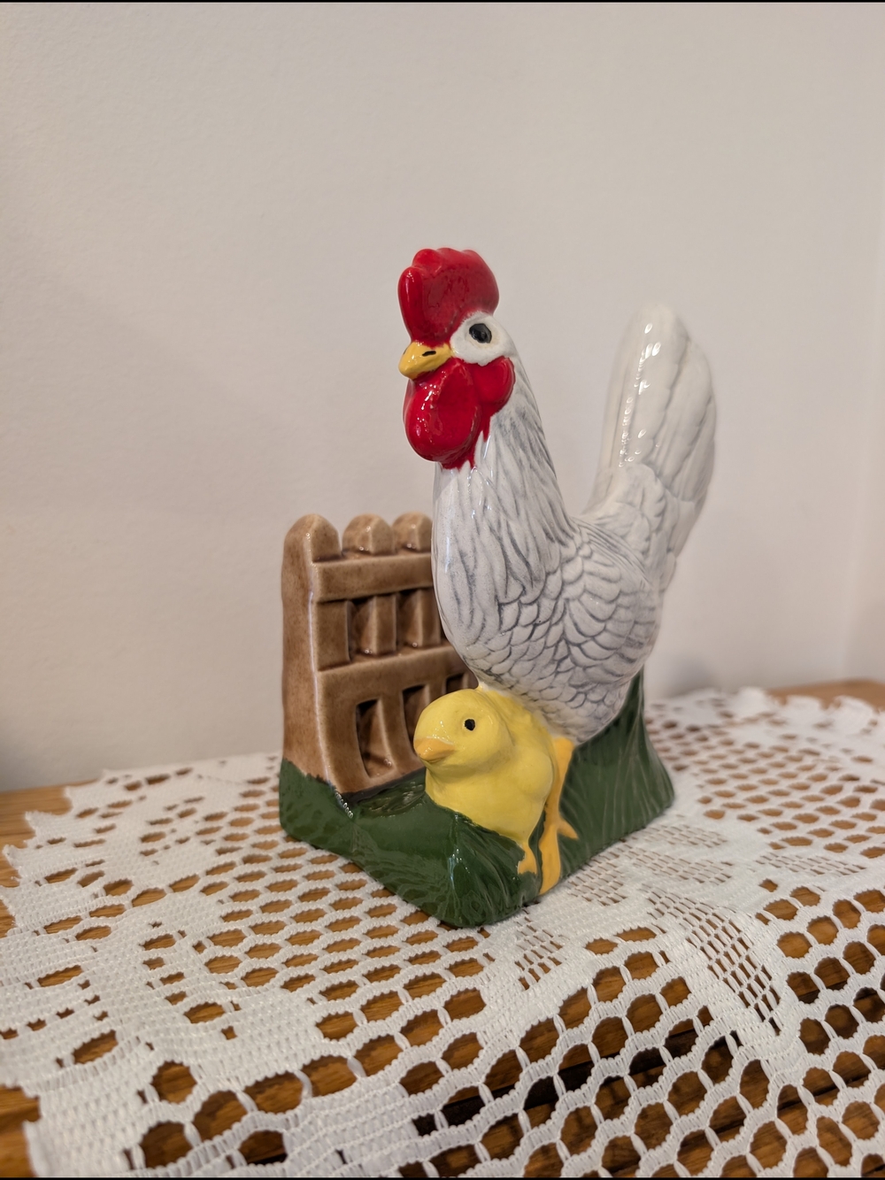 Charming vintage ceramic napkin holder featuring a colorful farmhouse rooster
